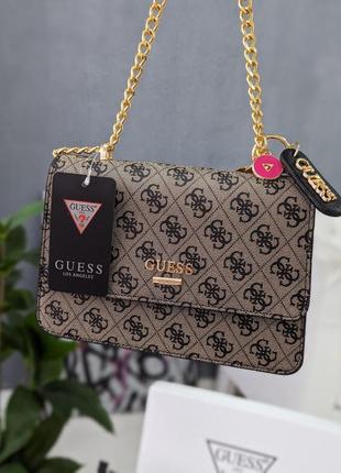 Сумка guess на три відіделення.4 фото