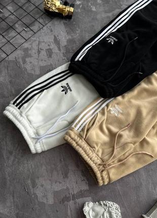 Теплі штани adidas3 фото