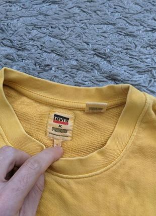 Желтый свитшот с принтом levi's x peanuts, oversize s/m/l(на бирке s), состояние идеальное, цвет напитан. 
подмышки 63
длина 722 фото