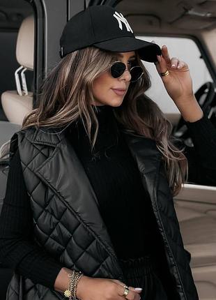 Женская жилетка