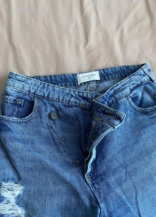 Порванные джинсы3 фото