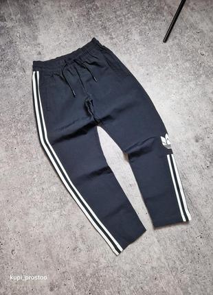 Нейлоновые adicolor track pants adidas1 фото