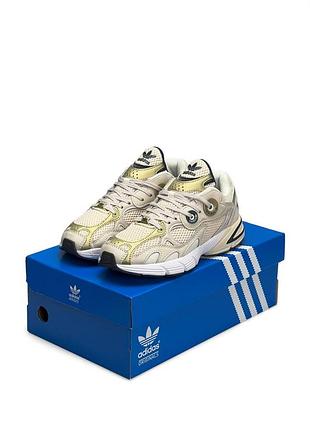 Трендові кросівки adidas astir бежеві з золотим