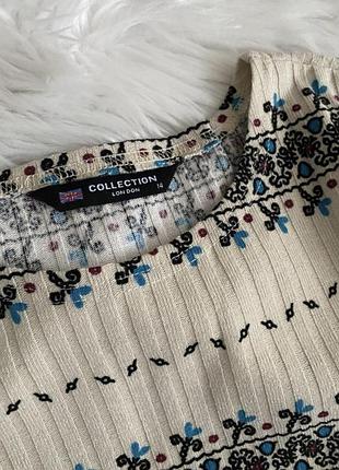 Тепленькое платье в красивый принт4 фото