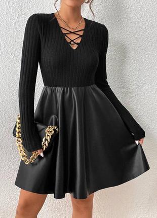 Стильное черное платье с эко кожей и пышной юбкой4 фото