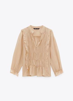 Бежева блуза з рюшами zara