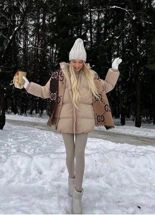 Жіноча зимова коротка куртка з капюшоном7 фото
