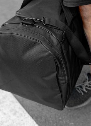 Чоловіча дорожня спортивна сумка nike biz чорна тканинна для тренувань та перевезення речей на 60 л7 фото