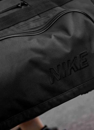 Чоловіча дорожня спортивна сумка nike biz чорна тканинна для тренувань та перевезення речей на 60 л4 фото