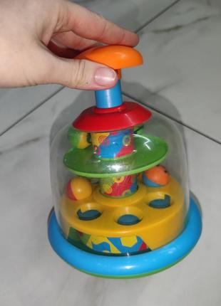 Детскся крутящаяся развлекательная игрушка спинеер крутилка юла fisher price