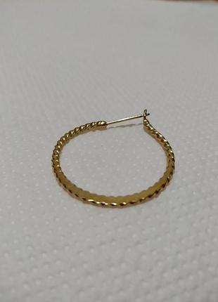 Одиночная серьга кольцо в золотом цвете1 фото
