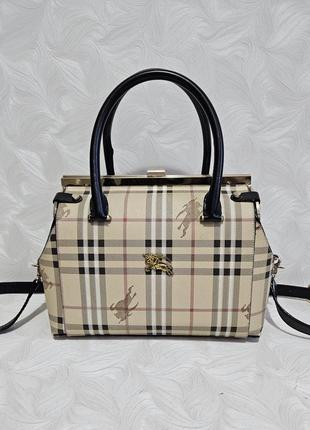 Красива сумка саквояж в стилі burberry