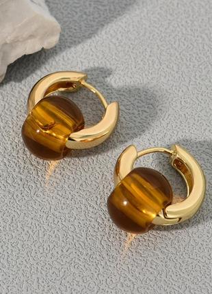 Тренд сережки трансформери кільця золотисті намистини кульчики під золото бусини коричневі