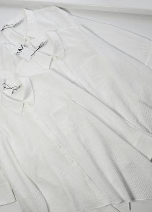 Новинка!белая рубашка асимметричного кроя из рельефной ткани удлиненная5 фото