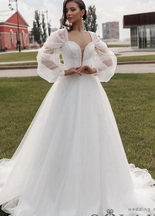 Жіноча весільна сукня біла зі шлейфом 42-44-46 розмір з рукавами3 фото