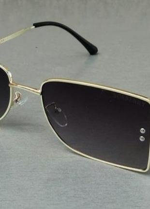 Окуляриі брендові  жіночі сонцезахисні темно сірий градієнт в золотій металевій оправі