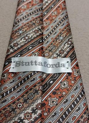 Качественный стильный брендовый галстук stuttafords6 фото