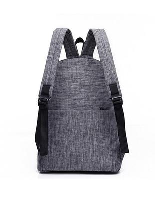 Стильный городской рюкзак унисекс серого цвета6 фото