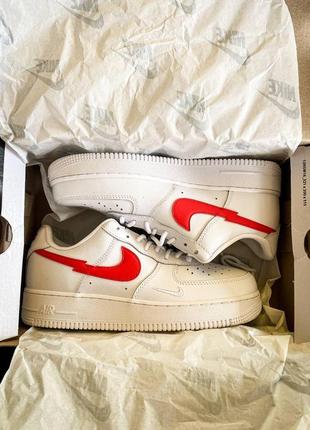 Женские кроссовки nike air force 1 low white red белого из красного цветов