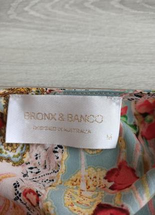 Шелковая блуза в цветочный принт от премиального бренда bronx and banco.5 фото