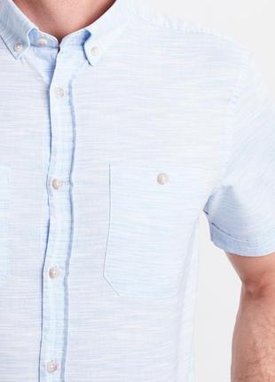 Голубая мужская рубашка lc waikiki в мелкую белую полоску, с карманами на груди4 фото