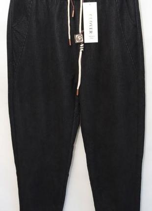 Женские утепленные вельветовые черные спортивные штаны в большом размере