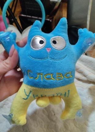 Игрушка мягкая кот желто голубой на присосках