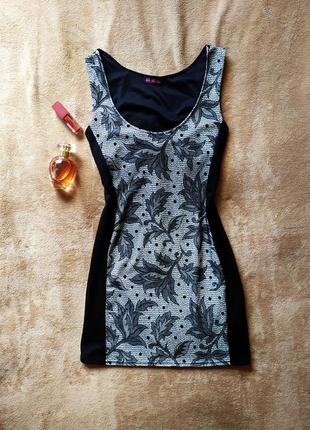 Красивое мини платье с черными вставками по бокам имитация кружева1 фото