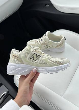 Женские кроссовки New Balance Homme 650 en Blanc Bleu beige gold бежевого с золотыми цветами