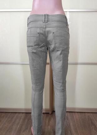 Штани джинси скінні штани з заклепками кольору хакі8 фото