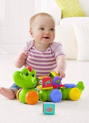 Розвиваюча іграшка fisher-price silly safari crawl around croc