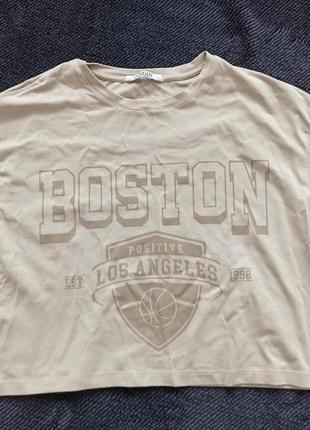 Укорочена футболка оверсайз