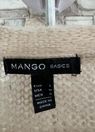 Жіночий вовняний светр павутинка mango2 фото