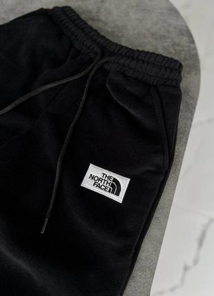 Теплі спортивні штани the north face2 фото