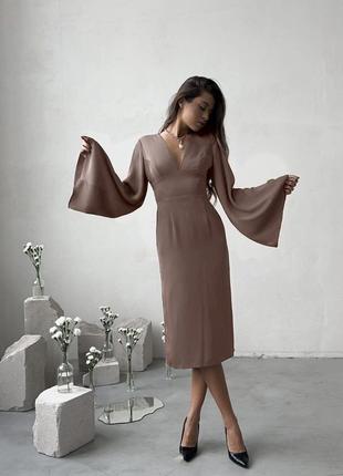 Роскошное шелковое платье с открытой спиной и объемными рукавами5 фото