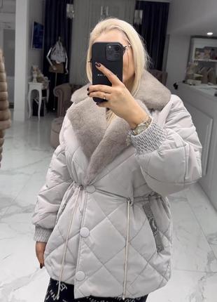 Зимовий пуховик з норкою