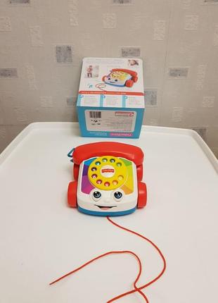 Веселий телефон на колесах fisher price