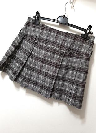 Deloras красивая мини юбка серая в оттенках в клеточку на кокетке в складки расширенная женская4 фото