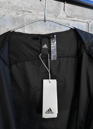 Куртка вітровка жіноча / чоловіча чорна з капюшоном легка adidas ia81359 фото