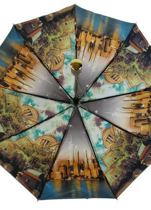 Зонт с двойным куполом и город внутри.2 фото
