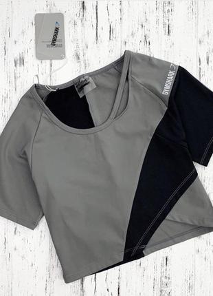 Женский кроп топ gymshark asymmetric оригинал3 фото