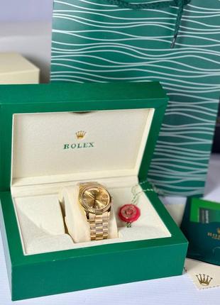 Часы наручные золотистые механические брендовые в стиле rolex