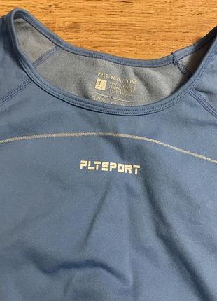 Prettylittlething синя спортивна безшовна укорочена футболка розмір l8 фото