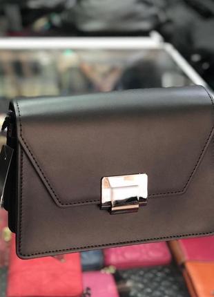 Шкіряна італійська жіноча чорна сумка3 фото