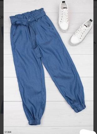 Стильные джинсы широкие на манжете с поясом модные