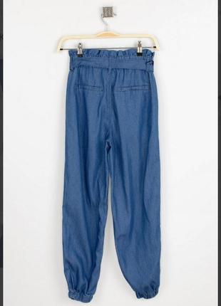 Стильные джинсы широкие на манжете с поясом модные4 фото