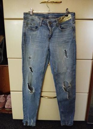 Рваные бомбезные джинсы1 фото