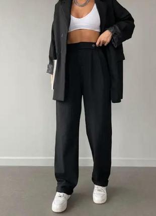Женские брюки палаццо офисные стильные широкие черные из костюмной ткани (42-44, 44-46)3 фото