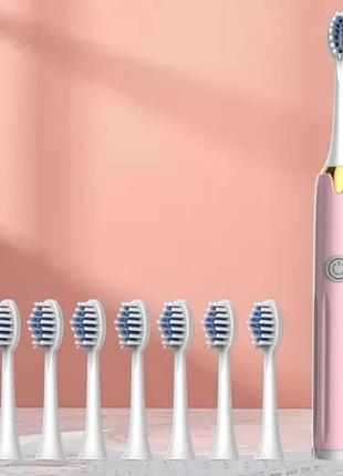 Електрична зубна щігка з щітками-насадками. 8 шт.2 фото