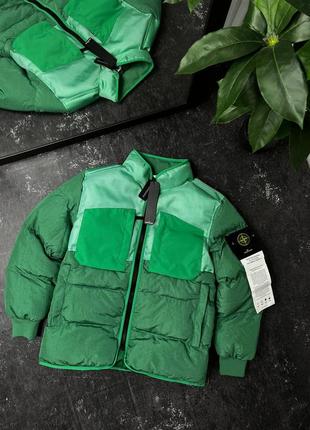 Топовый пуховик stone island modified panama nylon mix down
jacket